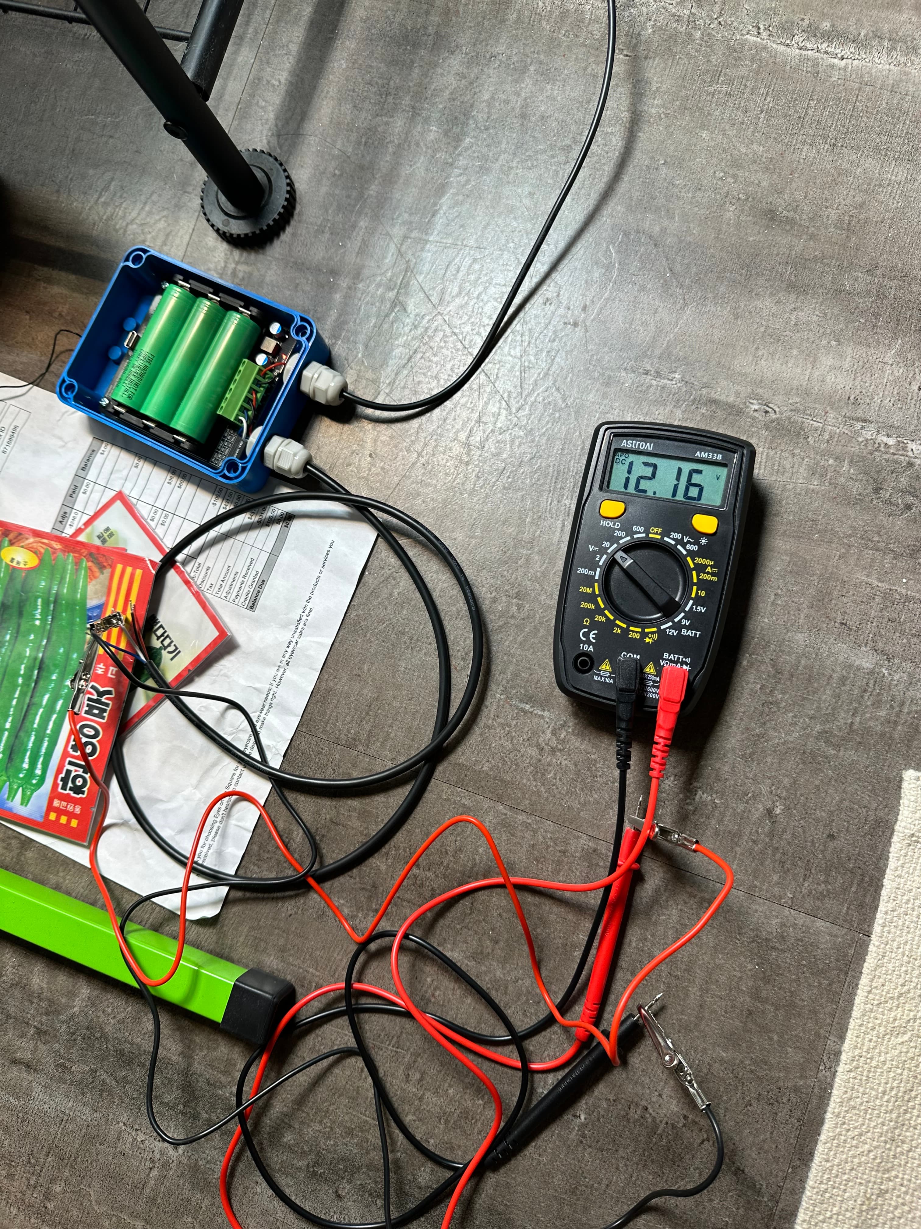 12.16 V on the other rail — characterizing the solar bank's outputs.